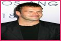 Jonny Lee Miller flashes ink for Ellen charity